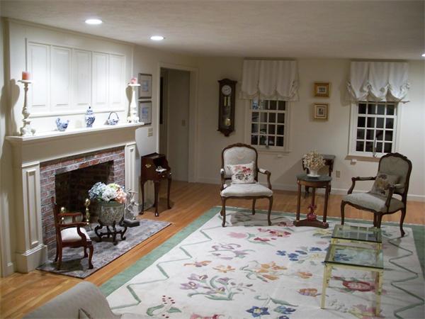 164 Kettle Hole Road Bolton, MA 01740 - Photo 16 of 28 a living room with furniture and a fireplace