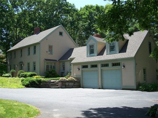 164 Kettle Hole Road Bolton, MA 01740 - Photo 2 of 28 a front view of a house with a yard