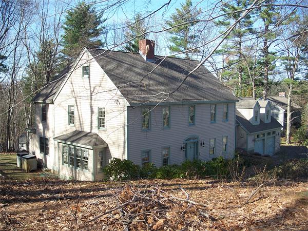 164 Kettle Hole Road Bolton, MA 01740 - Photo 23 of 28 a front view of a house with a yard
