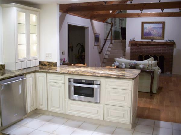164 Kettle Hole Road Bolton, MA 01740 - Photo 6 of 28 a kitchen with a stove and a sink