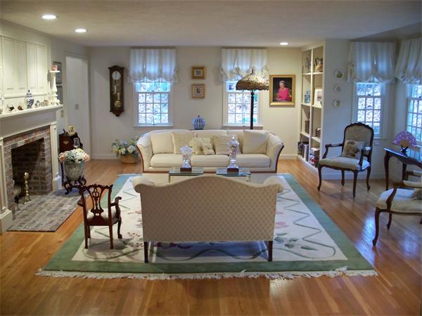 164 Kettle Hole Road Bolton, MA 01740 - Photo 9 of 28 a living room with furniture and a fireplace
