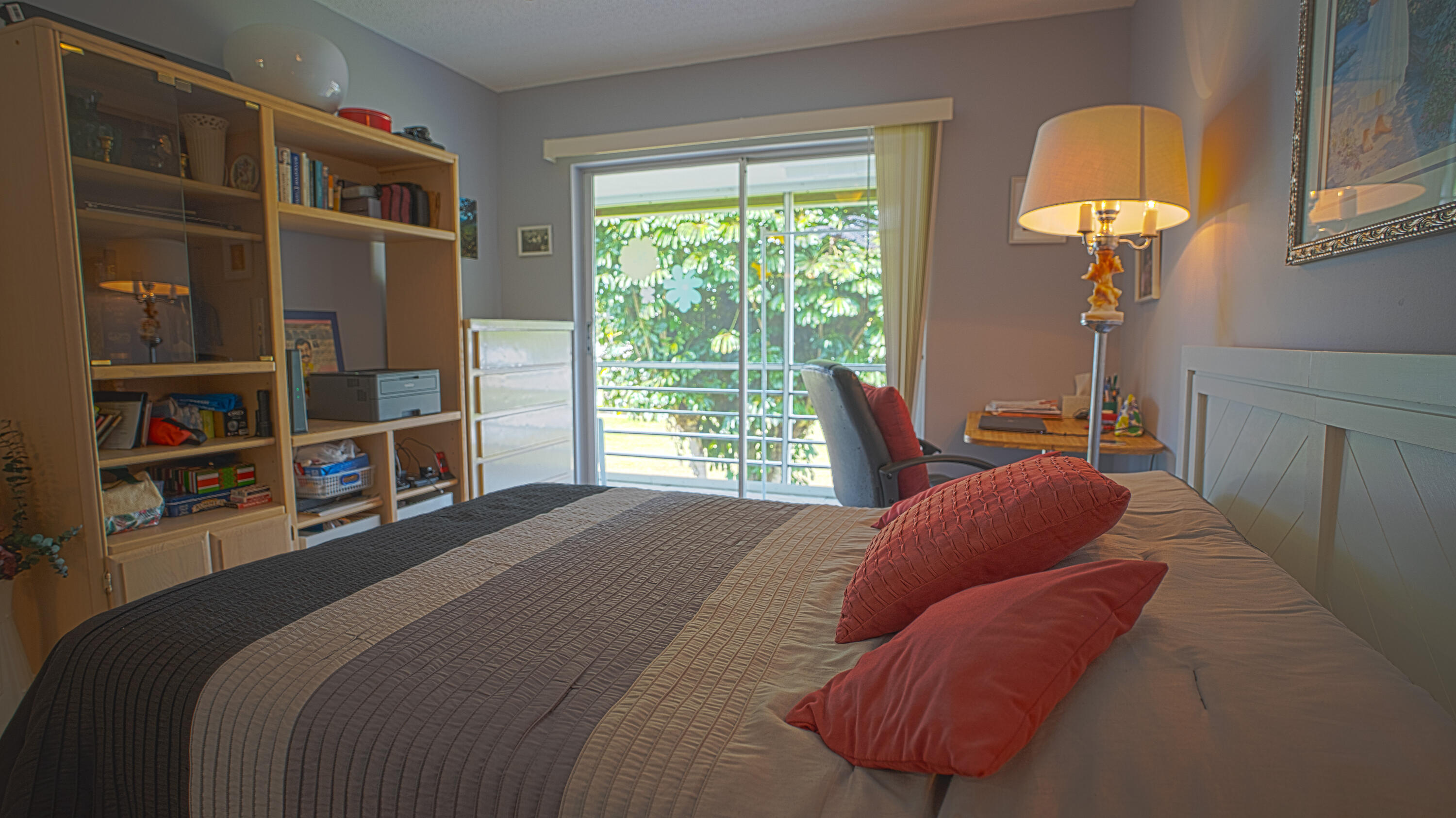 240 Windsor K West Palm Beach, FL 33417 - Photo 16 of 30 a bedroom with a bed and a window