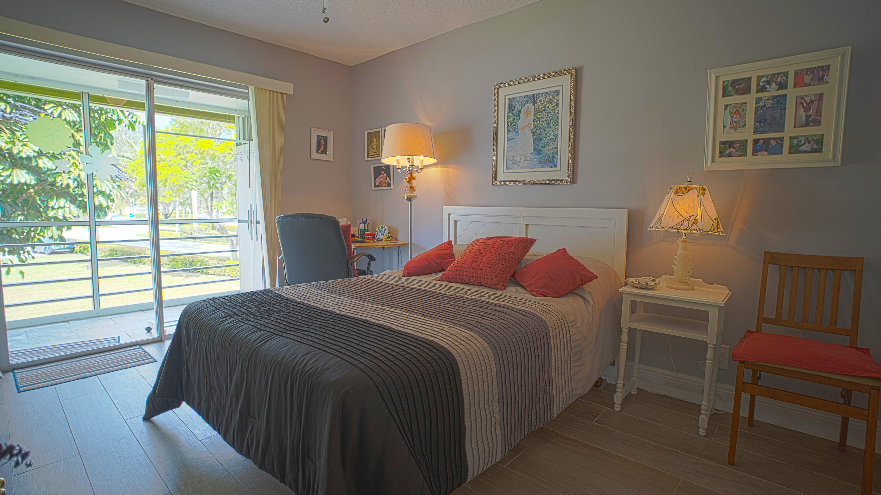 240 Windsor K West Palm Beach, FL 33417 - Photo 17 of 30 a bedroom with a bed and a window