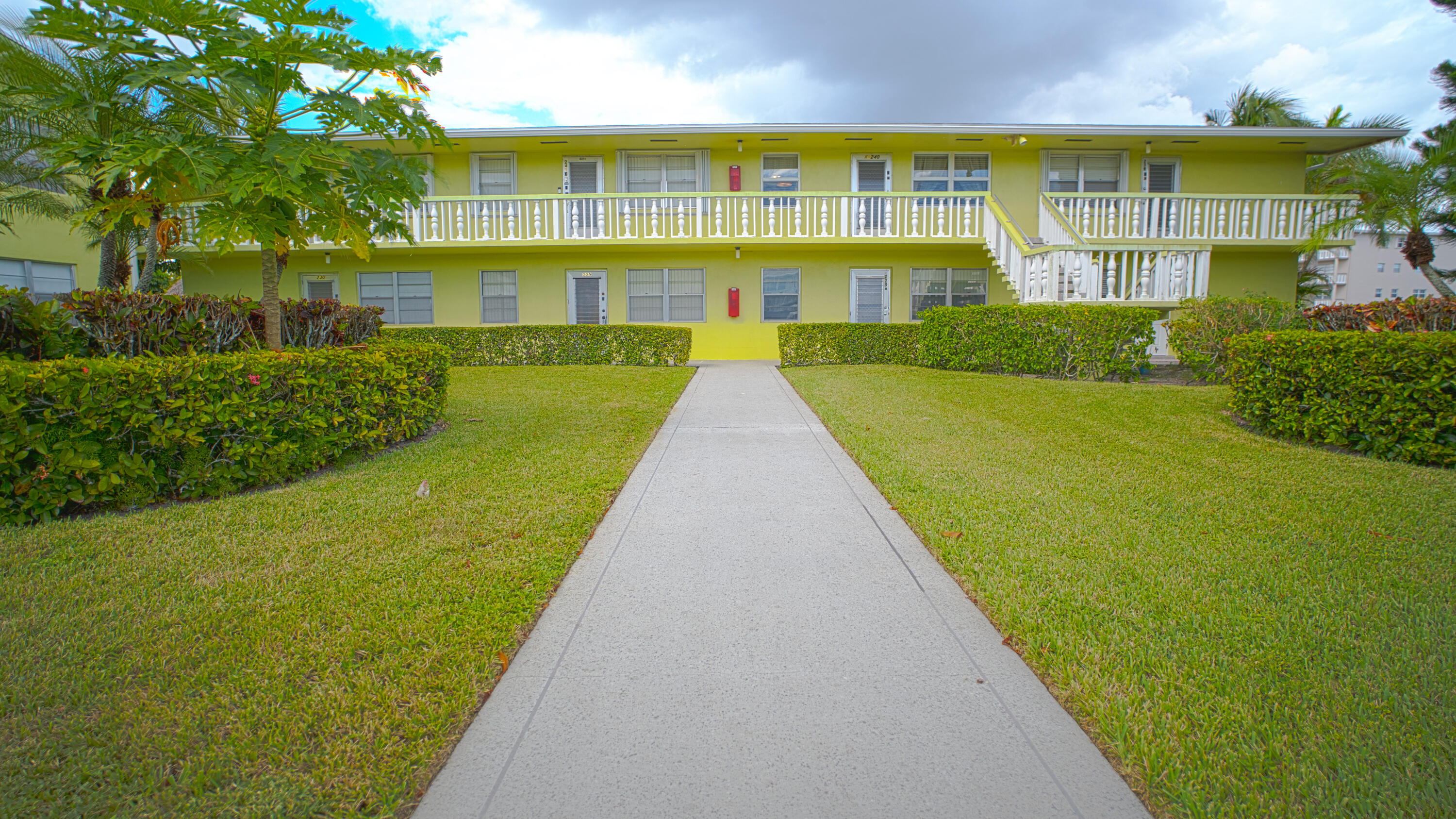 240 Windsor K West Palm Beach, FL 33417 - Photo 2 of 30 a view of swimming pool with outdoor seating