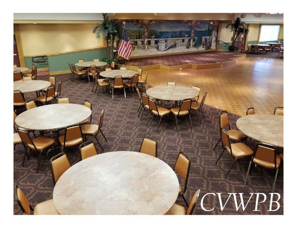 240 Windsor K West Palm Beach, FL 33417 - Photo 28 of 30 a view of a patio with dining table and chairs with wooden floor