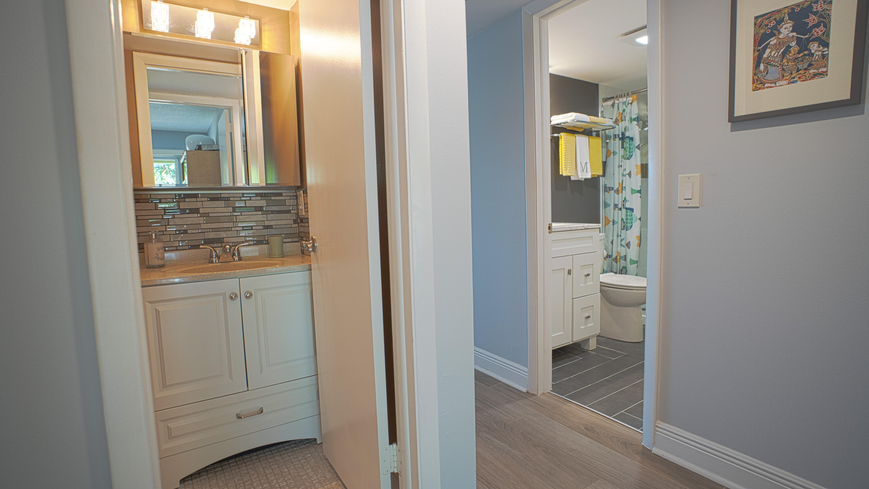 240 Windsor K West Palm Beach, FL 33417 - Photo 10 of 30 a view of a hallway with bathroom and a bathroom