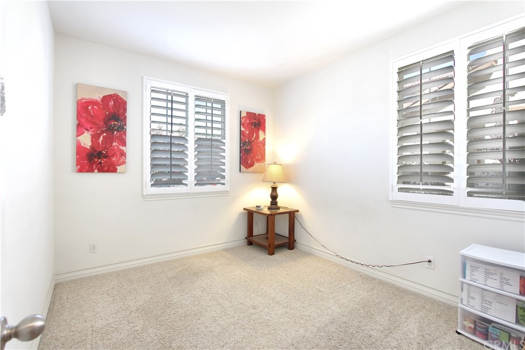 35107 Hogan Drive Beaumont, CA 92223 - Photo 14 of 42 a living room with furniture and a window