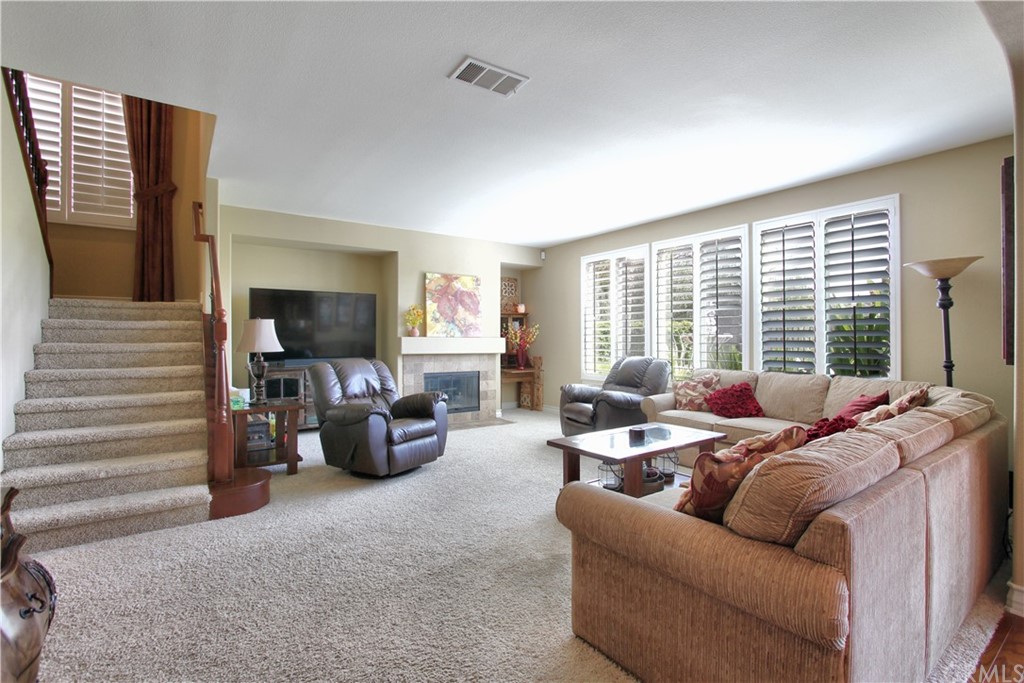 35107 Hogan Drive Beaumont, CA 92223 - Photo 16 of 42 a living room with furniture and large windows