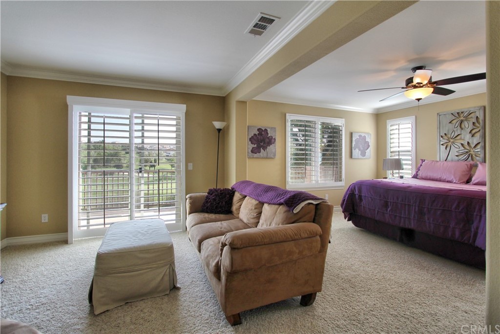 35107 Hogan Drive Beaumont, CA 92223 - Photo 23 of 42 a living room with furniture and a large window