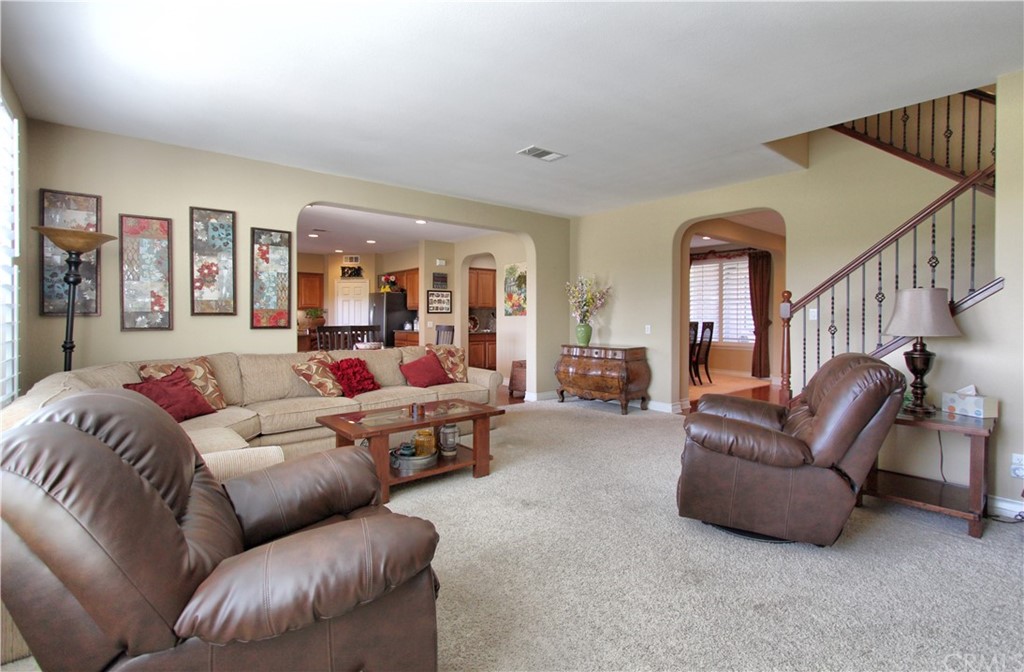 35107 Hogan Drive Beaumont, CA 92223 - Photo 5 of 42 a living room with furniture and a large window
