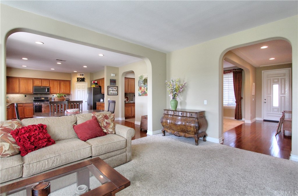 35107 Hogan Drive Beaumont, CA 92223 - Photo 6 of 42 a living room with furniture and kitchen view