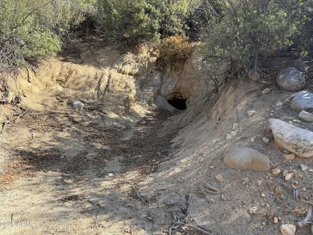 a bathroom with a toilet and shower