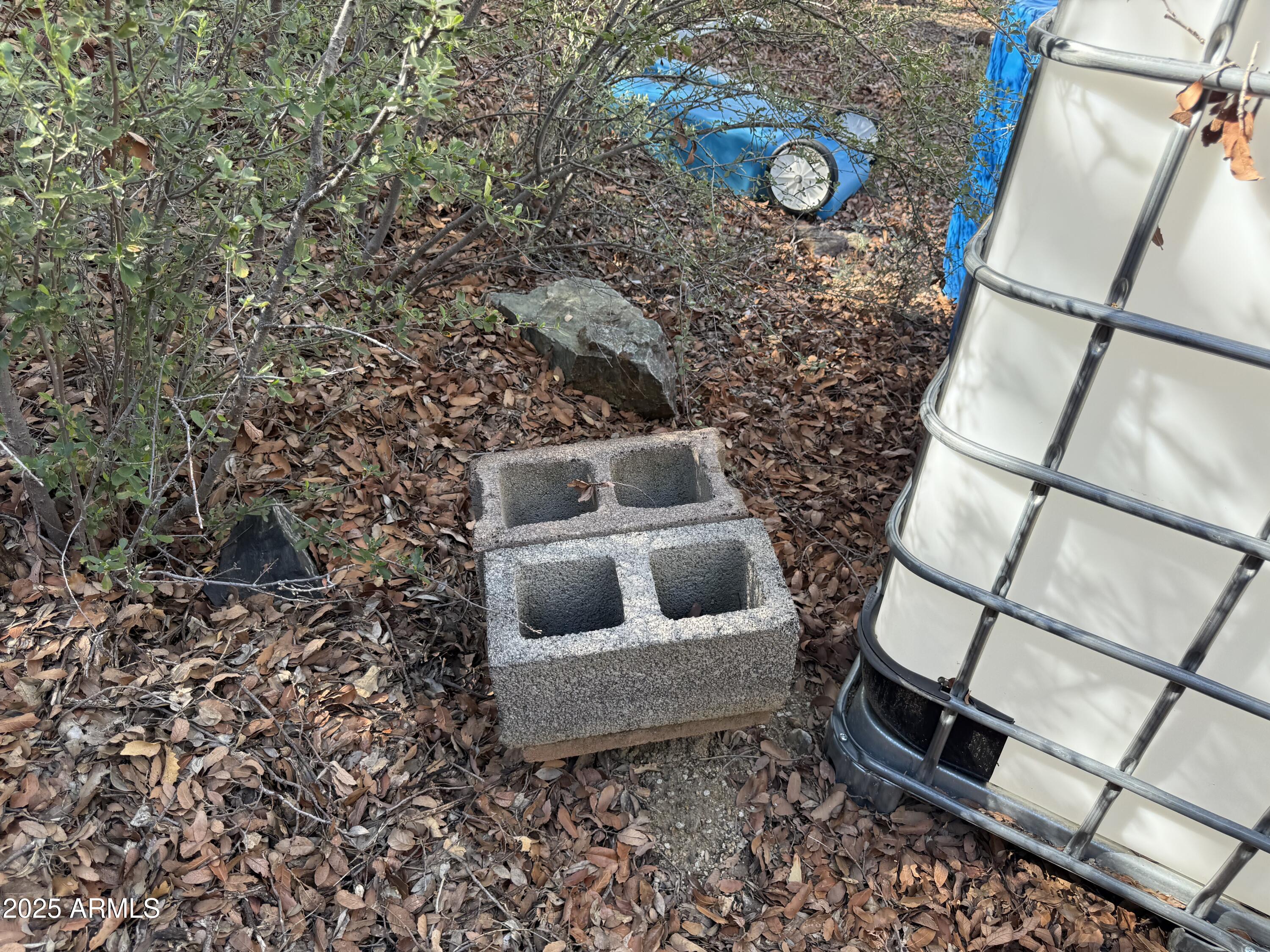 22865 South Gladiator Mine Road Crown King, AZ 86343 - Photo 18 of 20 a bathroom with a toilet and shower