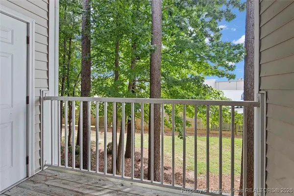a view of a wooden fence and floor