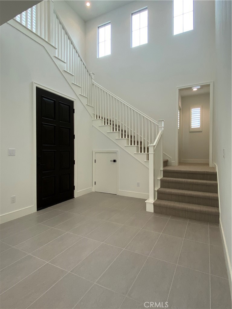 120 Spotted Quail Irvine, CA 92618 - Photo 11 of 32 a view of entryway with a front door