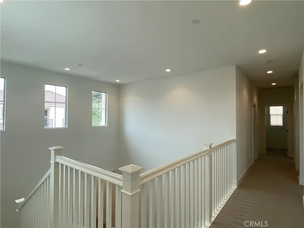 a view of hallway with stairs