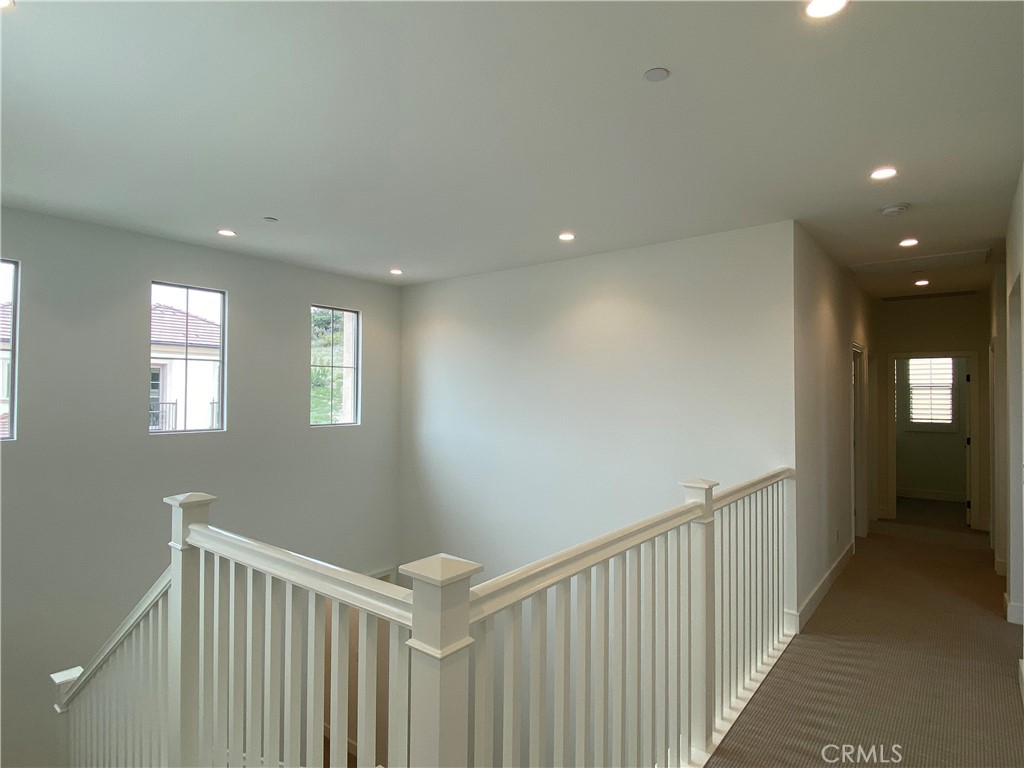 120 Spotted Quail Irvine, CA 92618 - Photo 13 of 32 a view of hallway with stairs