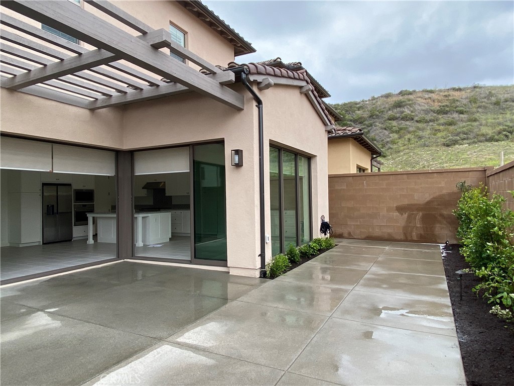 120 Spotted Quail Irvine, CA 92618 - Photo 30 of 32 a view of a house with a outdoor space