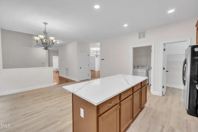 a very nice looking dining room with wooden floor