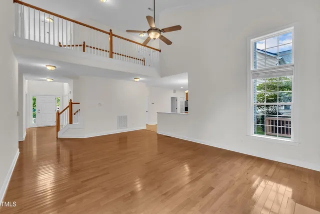a view of an entryway with wooden floor