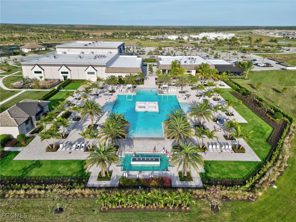20179 Napa Loop Estero, FL 33928 - Photo 2 of 49 an aerial view of residential building and parking space