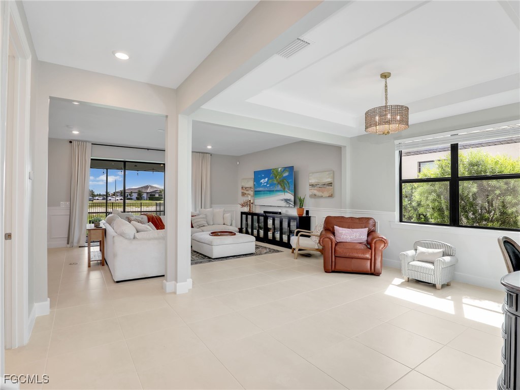 20179 Napa Loop Estero, FL 33928 - Photo 6 of 49 a living room with furniture and a window