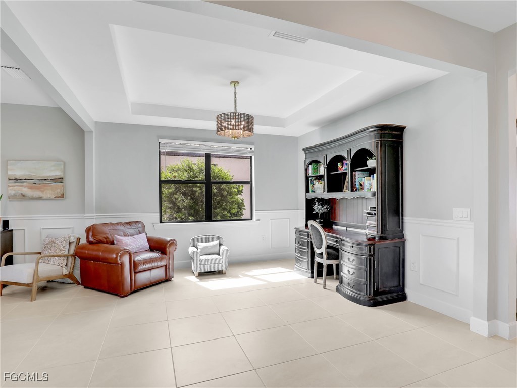 20179 Napa Loop Estero, FL 33928 - Photo 10 of 49 a living room with furniture and a window