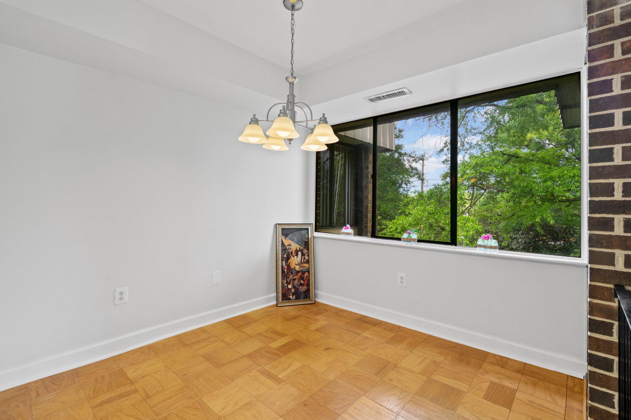 9804 Georgia Avenue, Unit 23302 Silver Spring, MD 20902 - Photo 5 of 24 Bright Dining Room off the Kitchen.