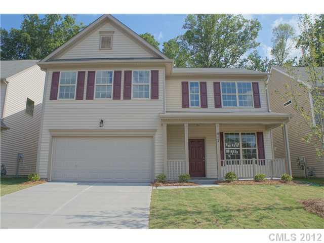 417 Rook Road Charlotte, NC 28216 - Photo 1 of 9 a front view of a house with a yard