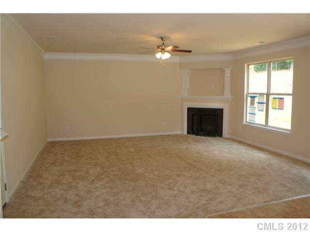 417 Rook Road Charlotte, NC 28216 - Photo 6 of 9 a view of an empty room with a window