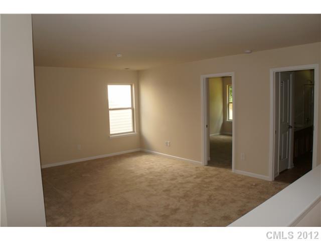 417 Rook Road Charlotte, NC 28216 - Photo 7 of 9 a view of an empty room and window