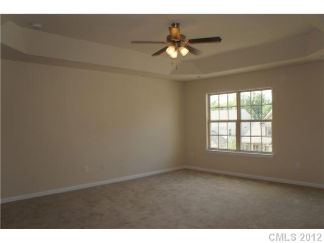 417 Rook Road Charlotte, NC 28216 - Photo 8 of 9 a view of an empty room with a window