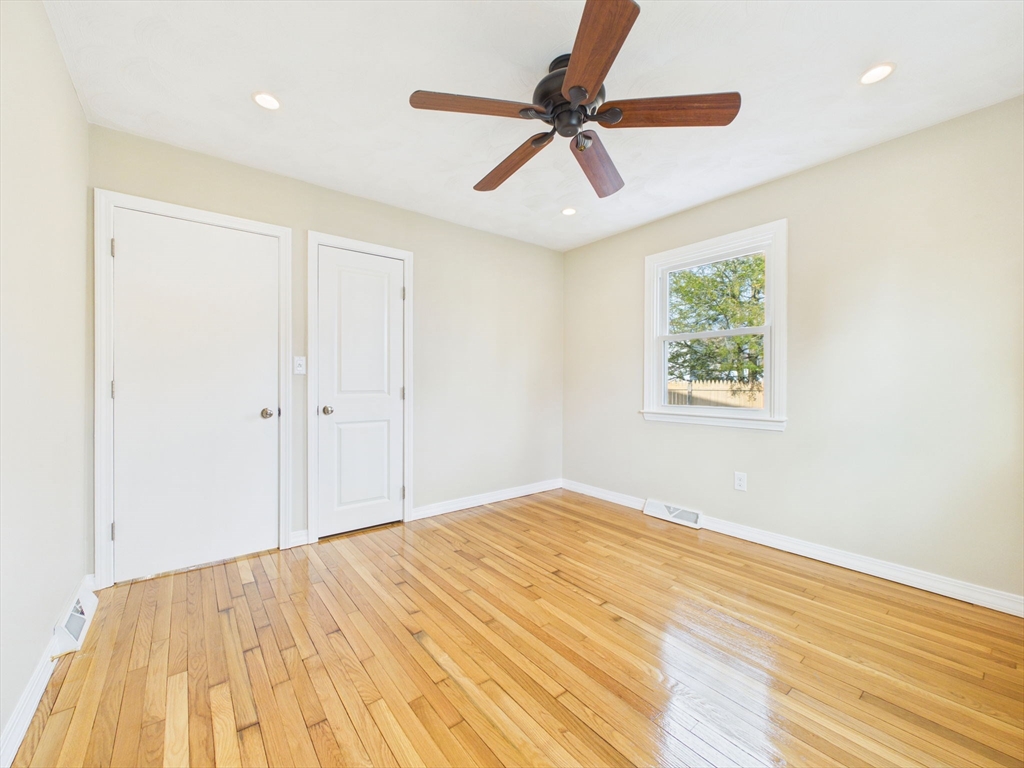786 Wildwood Road New Bedford, MA 02745 - Photo 17 of 39 a view of empty room with wooden floor