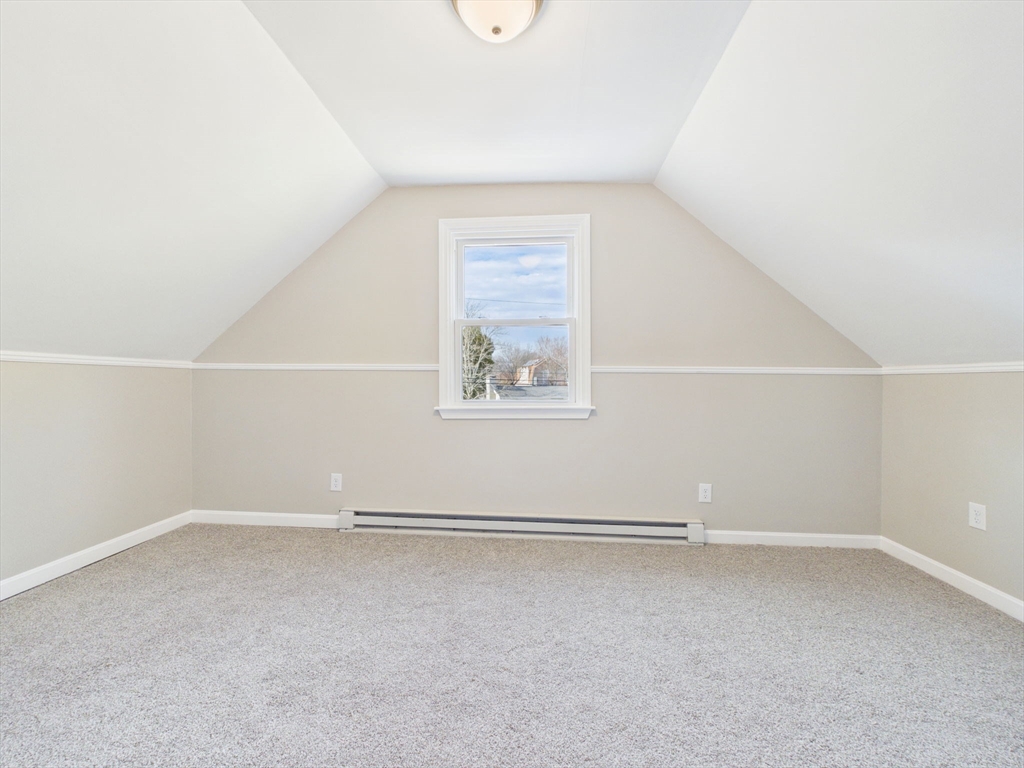 786 Wildwood Road New Bedford, MA 02745 - Photo 18 of 39 an empty room with a workbench