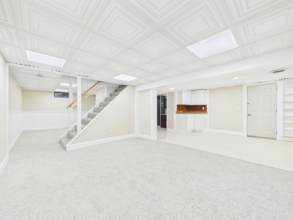 786 Wildwood Road New Bedford, MA 02745 - Photo 25 of 39 a view of an empty room with stairs