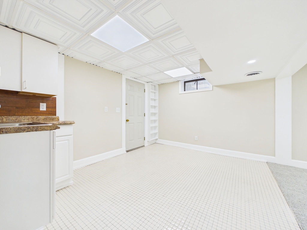 786 Wildwood Road New Bedford, MA 02745 - Photo 29 of 39 a view of an empty room with kitchen