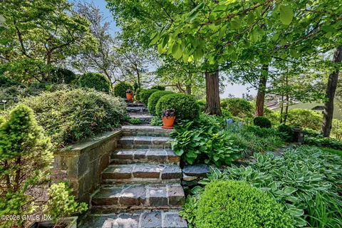 a view of a pathway of a yard