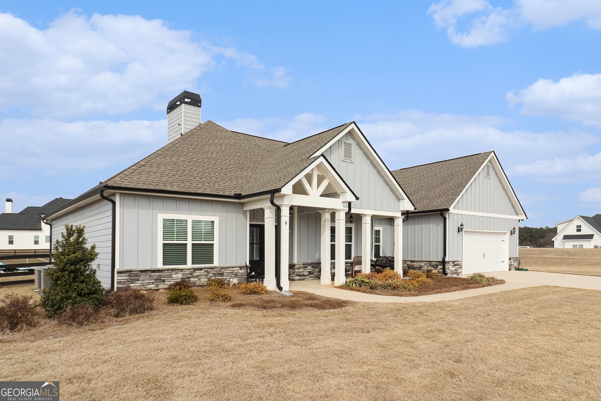 9 Union Street Newnan, GA 30263 - Photo 5 of 31 a front view of a house with a yard