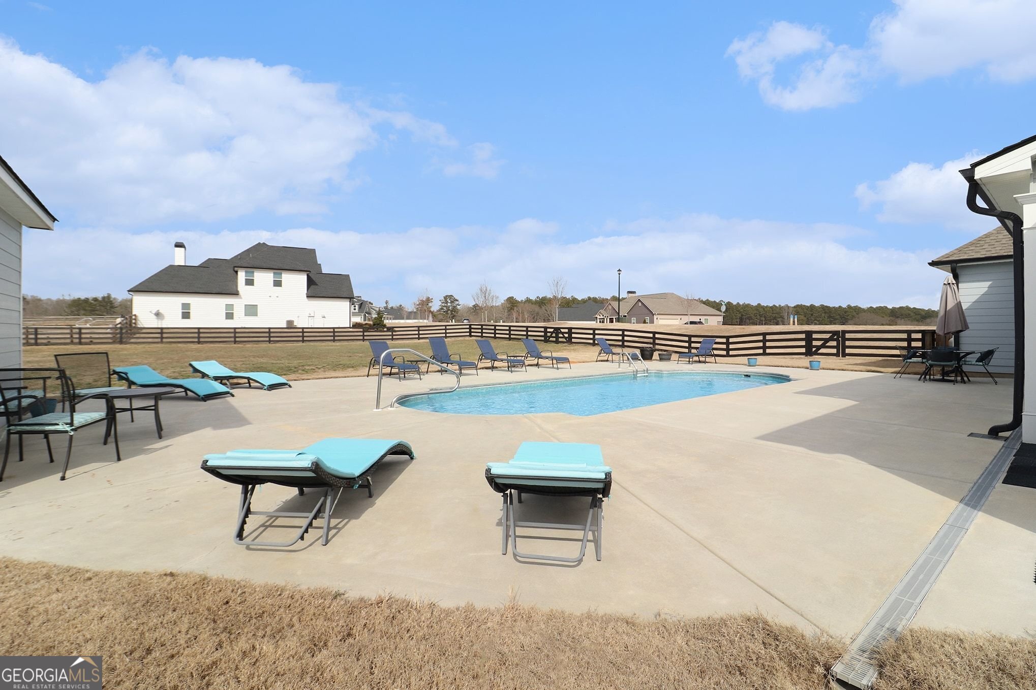 9 Union Street Newnan, GA 30263 - Photo 9 of 31 a view of a terrace with outdoor seating and city view
