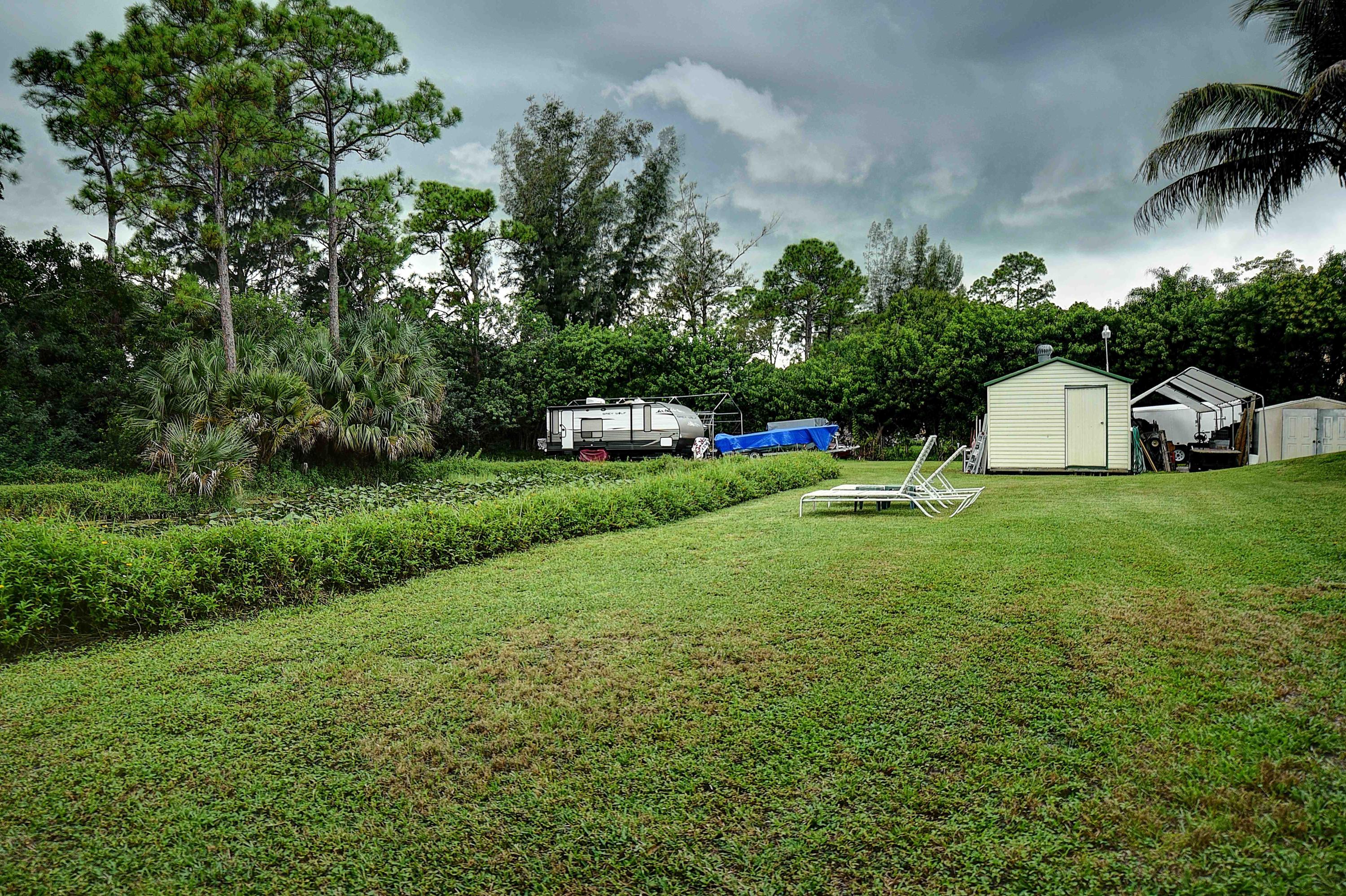 9362 Sandy Run Road Jupiter, FL 33478 - Photo 5 of 24 Sandy Run Back LQ