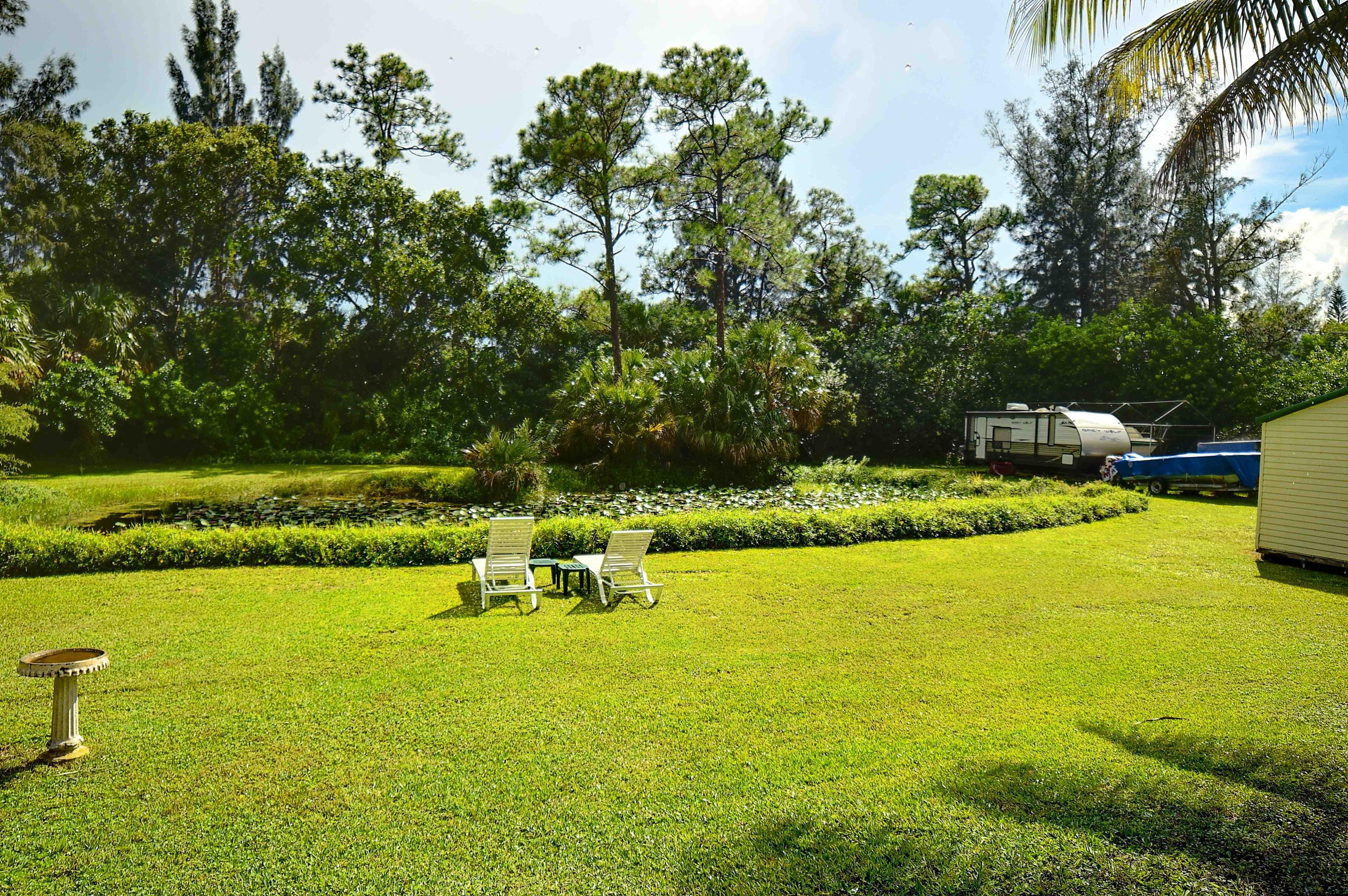 9362 Sandy Run Road Jupiter, FL 33478 - Photo 6 of 24 Sandy Run Backyard (2) LQ