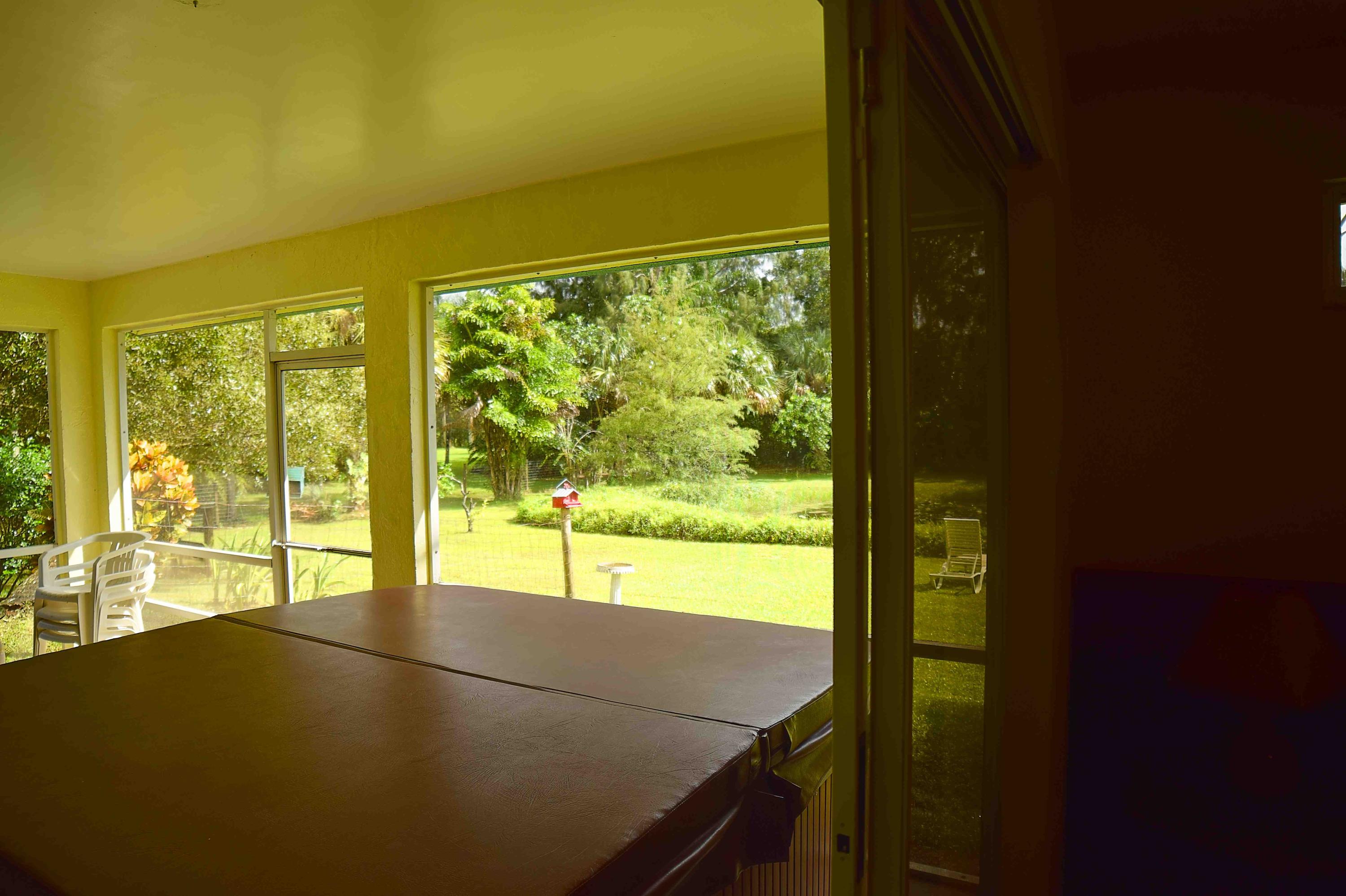 9362 Sandy Run Road Jupiter, FL 33478 - Photo 8 of 24 Sandy Run Patio and Hot Tub LQ