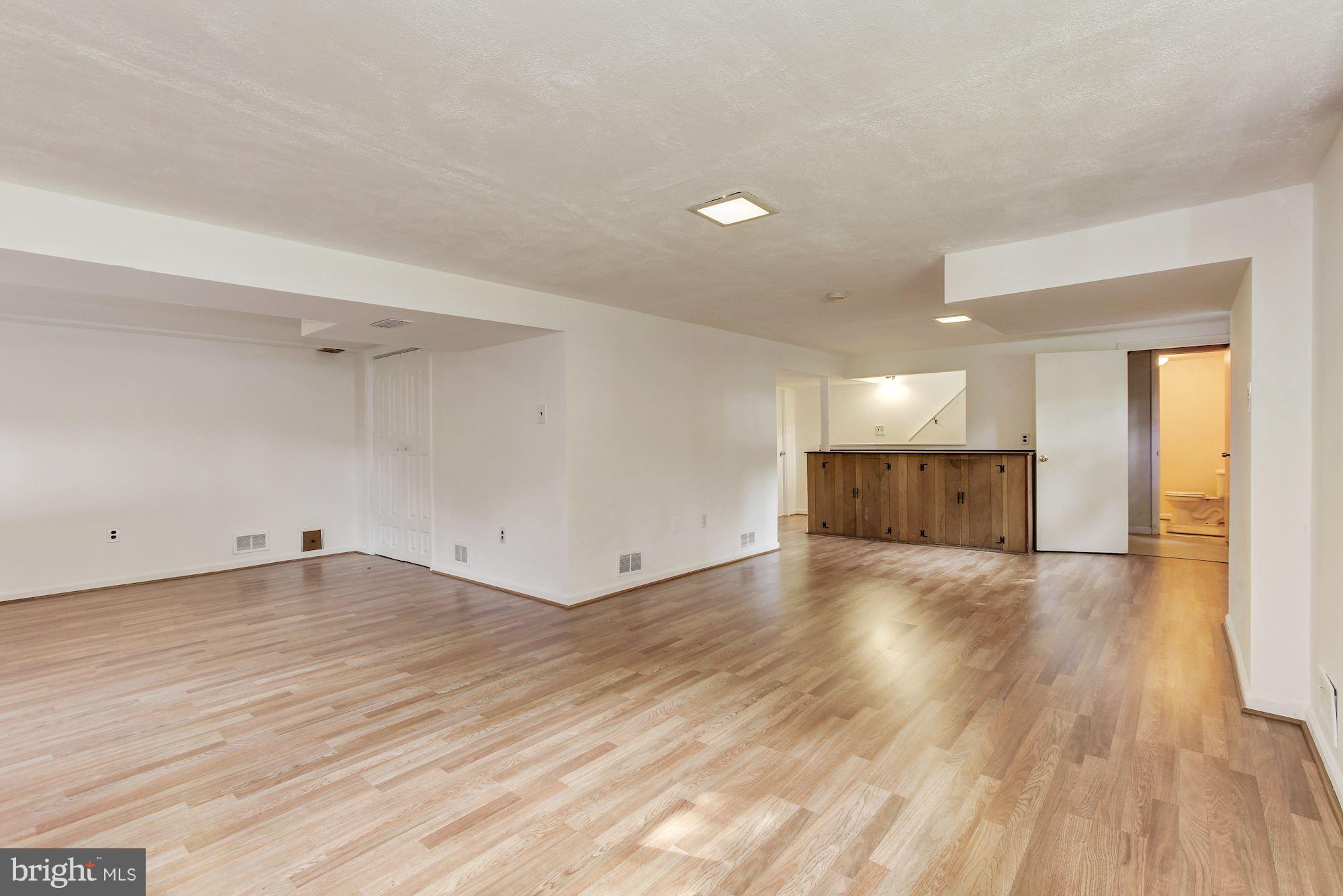 3926 Joliet Street Silver Spring, MD 20906 - Photo 20 of 30 Brand New Laminate Flooring in the Basement