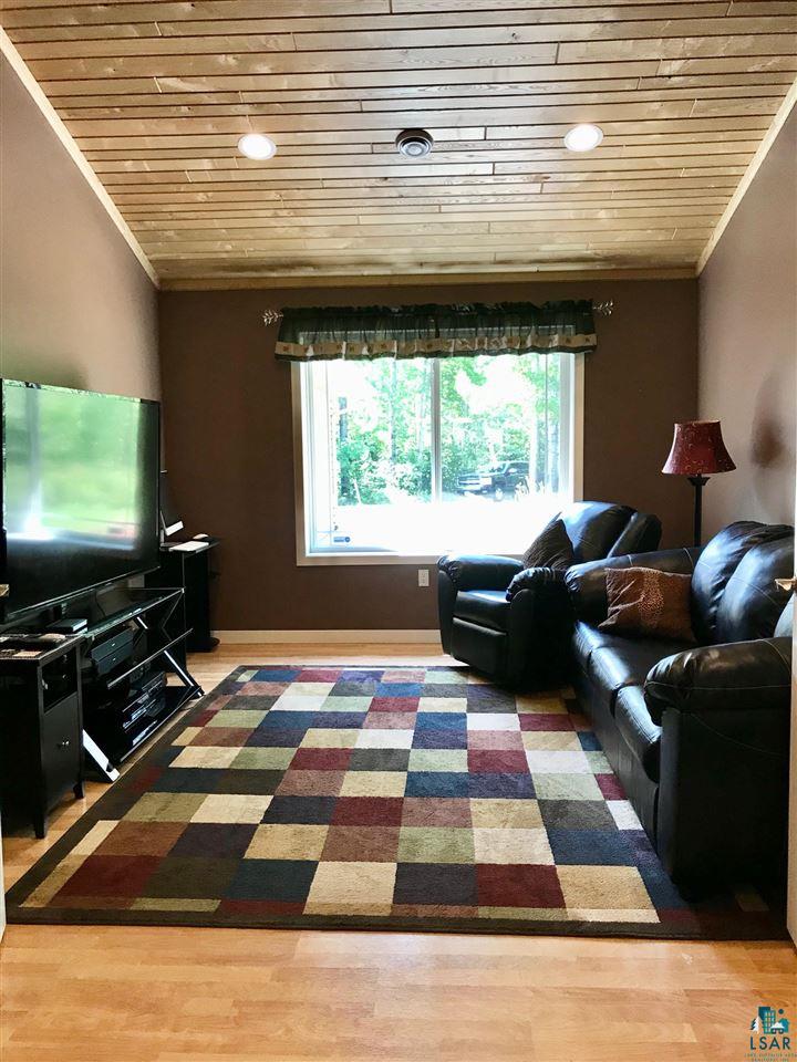 5048 Independence Road Saginaw, MN 55779 - Photo 14 of 34 DEN W FRENCH DOORS VAULTED T & G ASH CEILINGS
