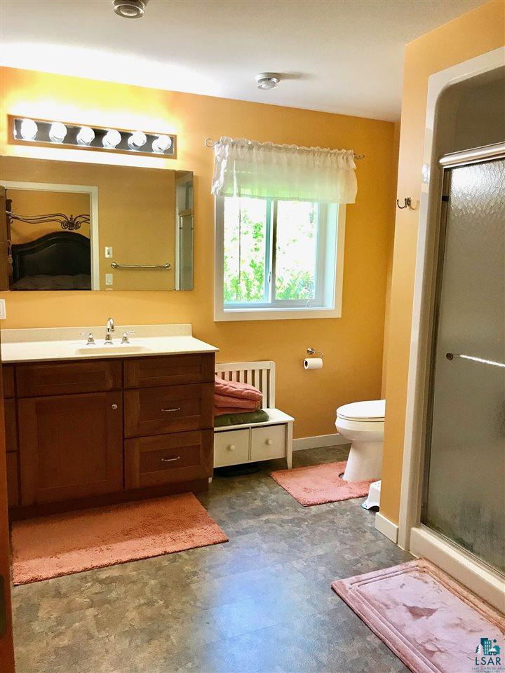 5048 Independence Road Saginaw, MN 55779 - Photo 22 of 34 PRIVATE MASTER BATH & WALK IN CLOSET