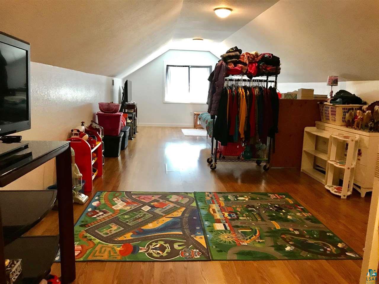 5048 Independence Road Saginaw, MN 55779 - Photo 26 of 34 HUGE UPPER LEVEL REC ROOM / FLEX SPACE