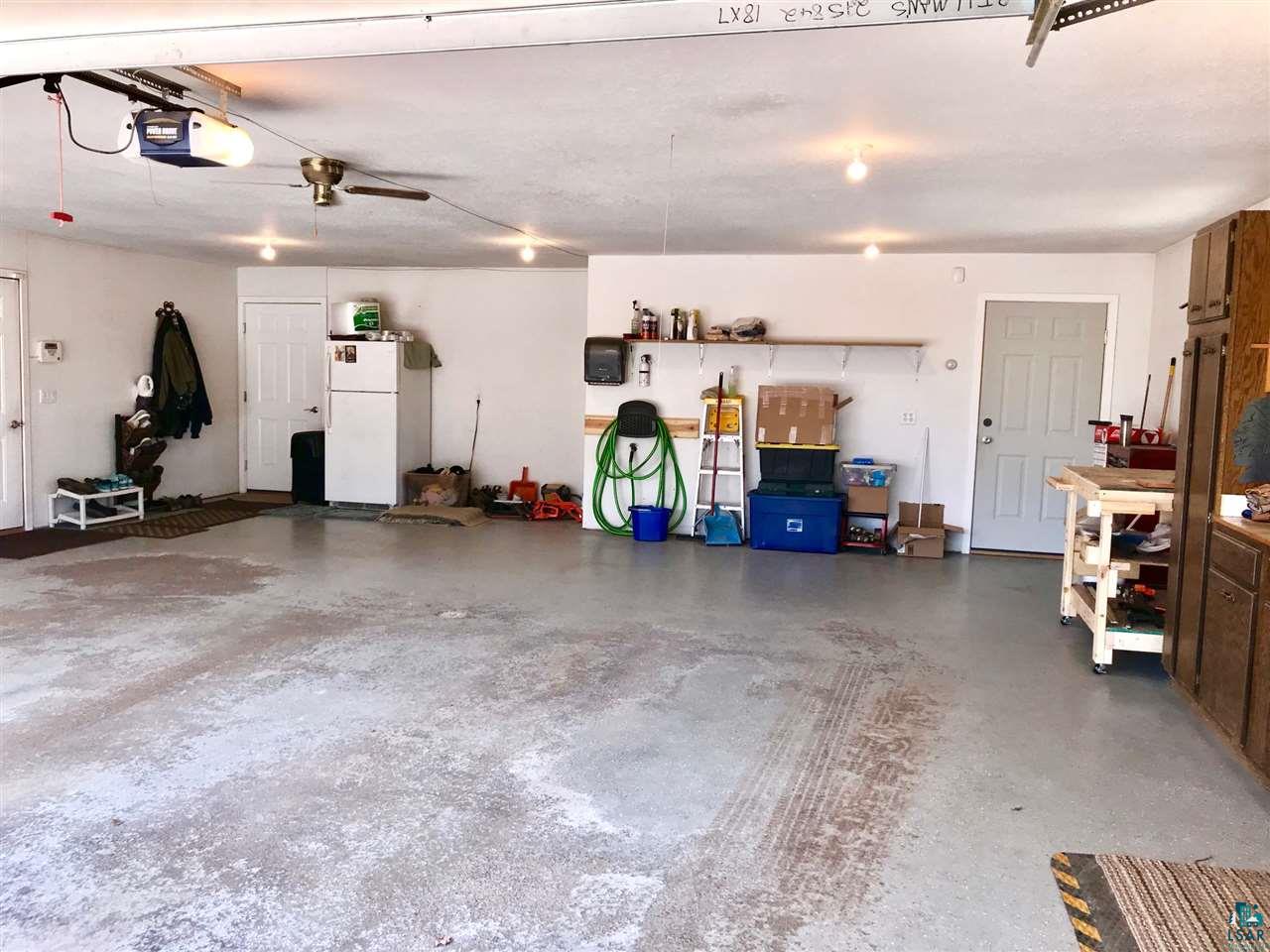 5048 Independence Road Saginaw, MN 55779 - Photo 28 of 34 HEATED RUNNING WATER 34X30 BUILT IN CABINETS & BENCHES