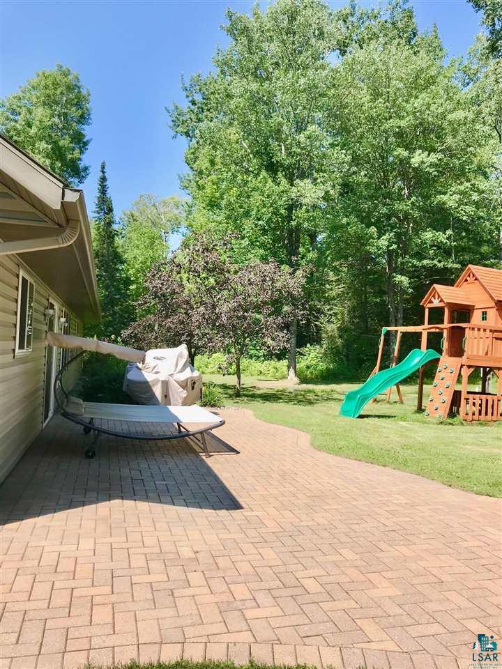 5048 Independence Road Saginaw, MN 55779 - Photo 30 of 34 HERRINGBONE PAVER PATIOS & SIDEWALKS