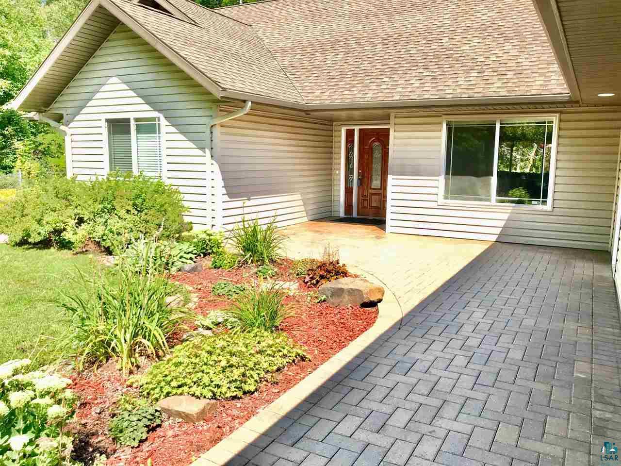 5048 Independence Road Saginaw, MN 55779 - Photo 4 of 34 FRONT ENTRY PROFESSIONAL LANDSCAPING