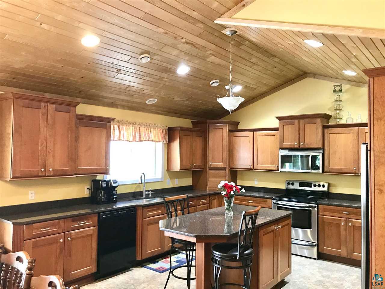 5048 Independence Road Saginaw, MN 55779 - Photo 7 of 34 CHERRY CABINETS GRANITE COUNTERS